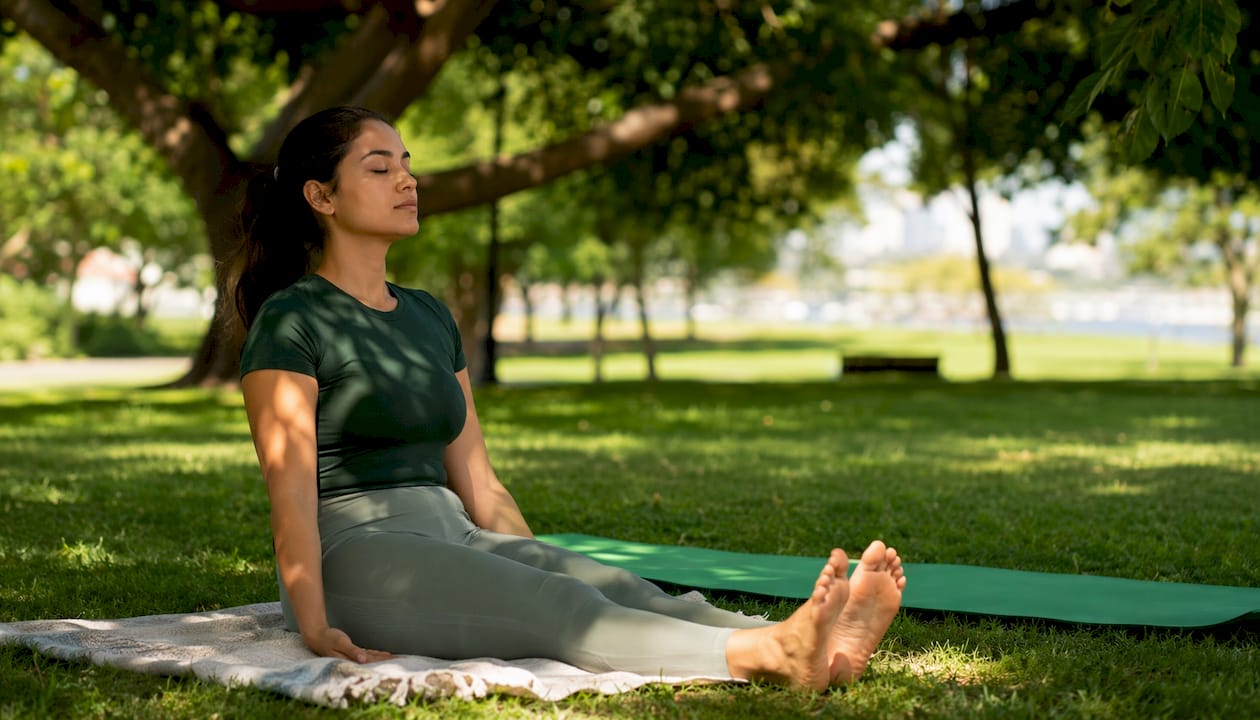 Woman practicing muscle relaxation indoors